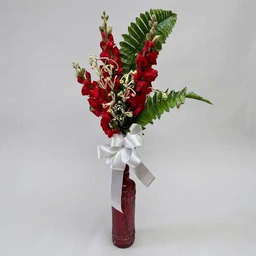 Handcrafted Floral Arrangement in a Decorative Wine Bottle