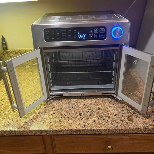 Emeril Lagasse Extra Large French Door Air Fryer Toaster Oven Combo, 24 Cooking Functions and Digital Controls, 7 Accessories Included, Stainless Steel Finish, 26QT Capacity